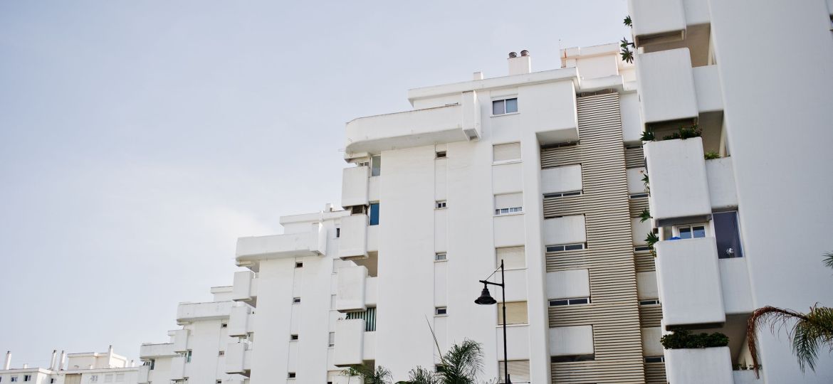 Streets with architecture of the resort town buildings and tropi