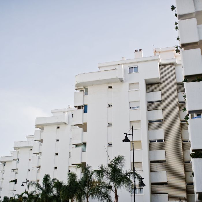 Streets with architecture of the resort town buildings and tropi
